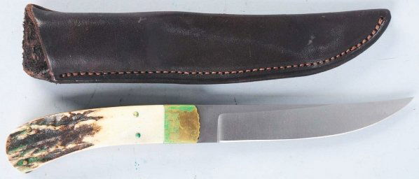 Crawell Knife.: Handle is stag fitted with a worked brass front mount as well as worked liners on either side of tang. No butt cap. Correct sheath is included. Condition (Near Mint Plus). Size Blade: 5 - 1/8" L.