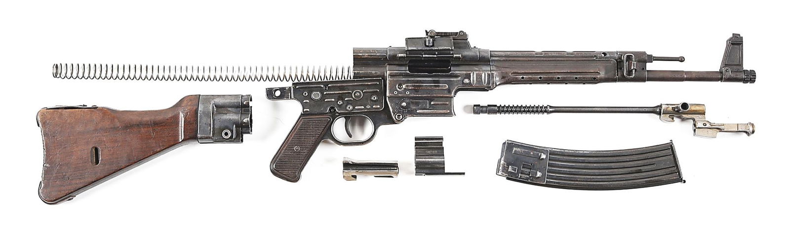 MP43 PARTS KIT WITH BLACK PLASTIC CASE.: Exceptional parts kit of an ERMA (ayf) MP-43 manufactured in 1944 machine gun. Receiver is cut several times with a significant piece of receiver not present. Remainder is marked “ayf” (ER