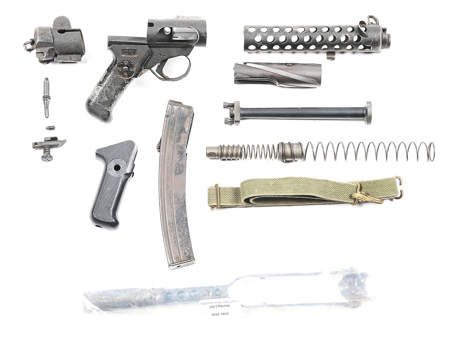 VALUABLE SAW-CUT BRITISH STERLING MK 4 (L2A3) MACHINE GUN PARTS KIT WITH GOOD BARREL AND STOCK: Scarce to find these days, this is a saw-cut British Sterling machine gun parts kit with extremely fine condition parts, including barrel, bolt with charging handle, shroud, magazine housing with maga