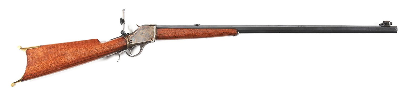 (A) WINCHESTER MODEL 1885 HIGH WALL SINGLE SHOT RIFLE WITH SWISS BUTTPLATE.: Manufactured in 1888. Fitted with a blued No. 3 weight octagon barrel with wind gauge spirit level front sight and filled-in rear sight dovetail. Tang mounted with a mid-range aperture rear sight. Cas