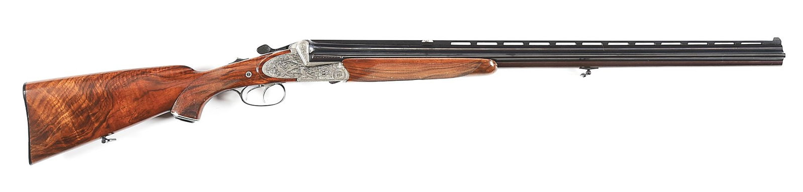(C) FRANZ SODIA BOCH DRILLING.: Known as a "Bock-Doppelflinte mit seitlichem Kleinkaliberlauf" or a "over-and-under shotgun with side-mounted small-caliber barrel" in English. Over/under shotgun barrels are chambered in 20 gauge, wi
