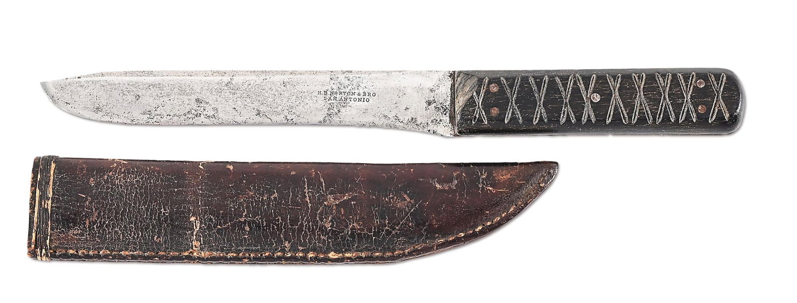 TEXAS BOWIE KNIFE MADE BY H.D. NORTON & BRO.: Circa 1850-1860s, scarcely seen Texas made Bowie knife made in San Antonio. Overall length of 11" with a 6 3/4" blade and a 1" false edge. Left ahnd side of blade is marked "H.D. NORTON & BRO / SAN AN