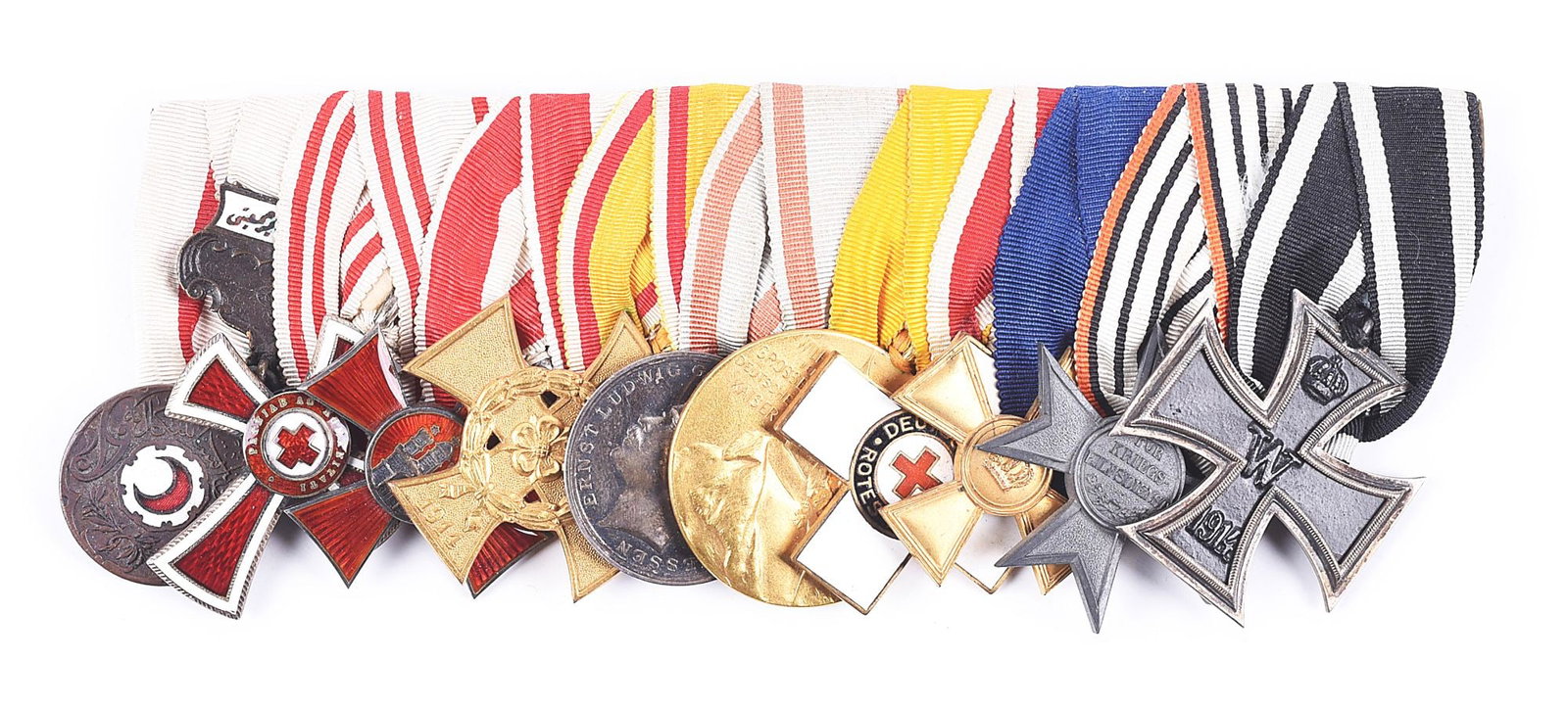 IMPERIAL GERMAN WWI GODET MEDAL BAR.: Imperial German World War I medal bar with 5 German awards from 1897 to 1914, 4 Austro-Hungarian awards, and 1 Turkish award. A tag from the well-known German medal manufacturer is sewn to the reverse