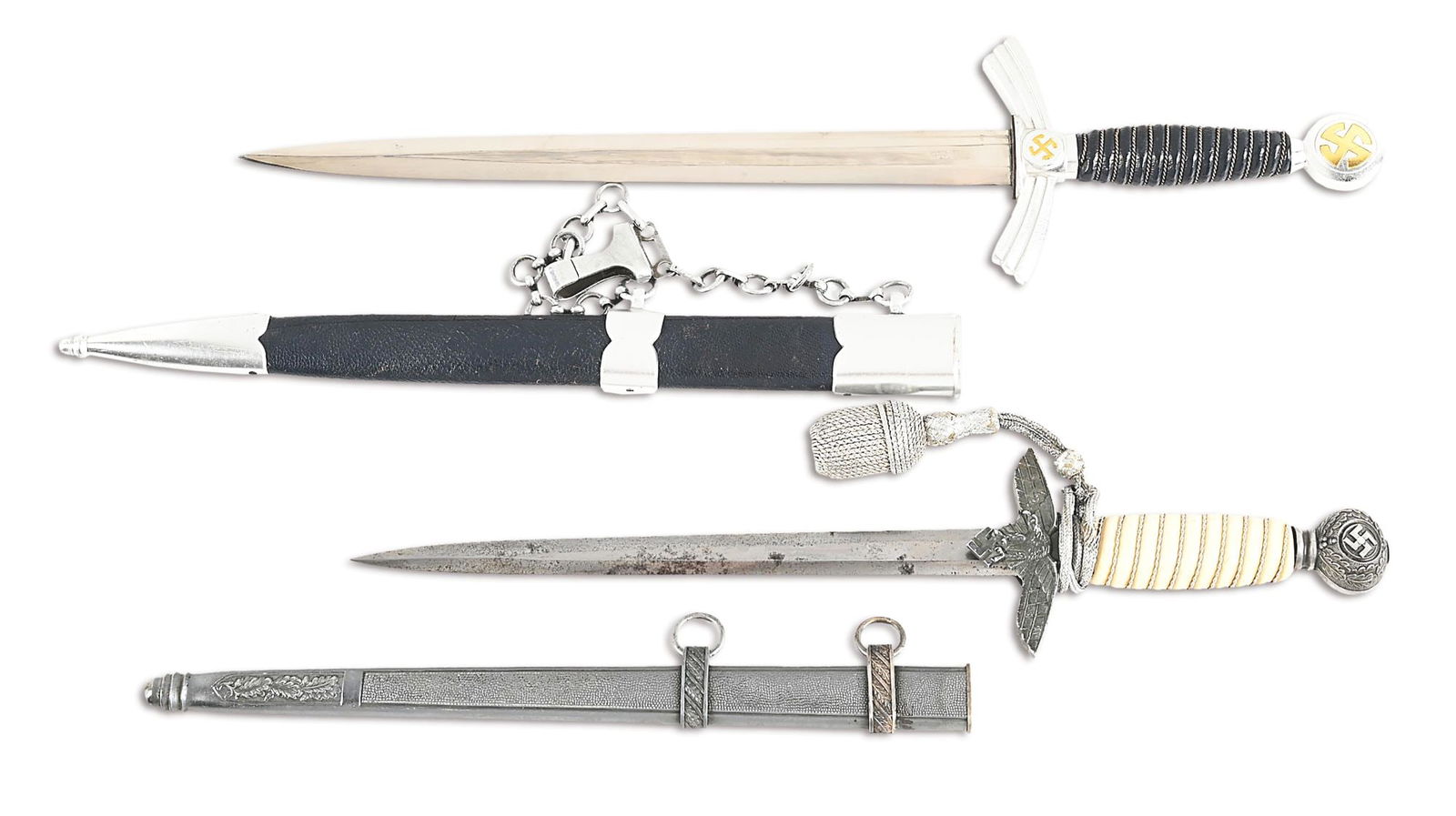 LOT OF 2: GERMAN WWII FIRST AND SECOND MODEL LUFTWAFFE DAGGERS.: Lot consists of: (A) German World War II Luftwaffe 1st model dagger with a "Tiger Solingen" marked blade with bright finish, light blemishes, and faint areas of cross graining. Aluminum fittings exhib