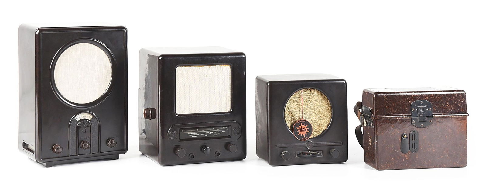 LOT OF 4: GERMAN WWII RADIOS AND FIELD PHONE.: Lot consists of: (A) German World War II Radio/Volksempfanger VE 301Wn. Bakelite housing is complete and without cracks or major damage. Textile loudspeaker is intact and firm. Measures approximately