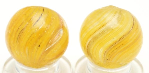 Lot of 2: Yellow Onionskin Lutz Marbles.: Both with yellow bases and lutz striping. Probably from the same cane. Condition (9.5 - 9.7). Size Each: 5/8"" Dia."