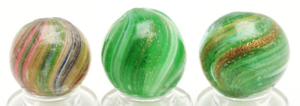 Lot of 3: Onionskin Lutz Marbles.: Includes one white and green onionskin lutz, one yellow and green onionskin lutz, and one pink, white, green, yellow, and blue onionskin with lutz. Condition (8.7 - 9.6). Size 5/8"" to 23/32"" Dia."