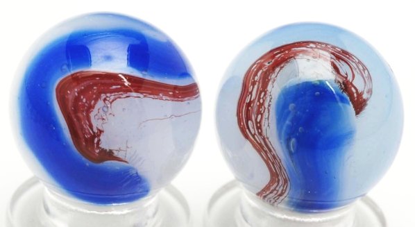 Lot of 2: Akro Agate Blue Oxblood Marbles.: The smaller blue oxblood has one flea bite and the larger marble is in good condition. Condition (8.9 - 9.5). Size 23/32"" & 3/4"" Dia."