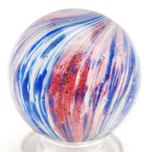 4-Paneled Onionskin Marble.: Faceted pontil. Two opposing panels of red and white and two opposing panels of blue and white. Surface has one micro flea bite (possibly as-made). Condition (8.95). Size 15/16"" Dia."