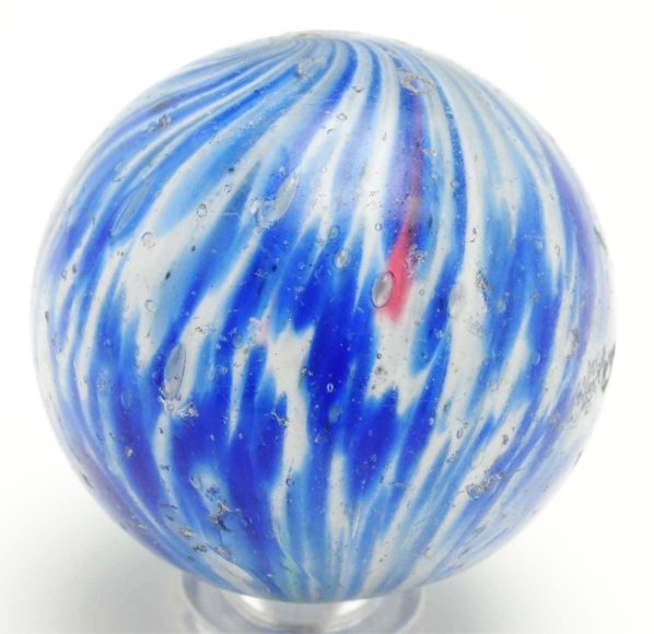 Large Onionskin Marble.: White base onionskin with blue spotting and some red. Condition (8.6). Size 1 - 5/8"" Dia."