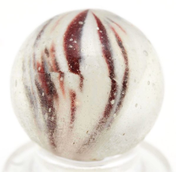 Shrunken Core Onionskin Marble.: Faceted pontil. White base with unusual dark brown. Very striking marble with a left-handed twist. Condition (9.5). Size 21/32"" Dia."