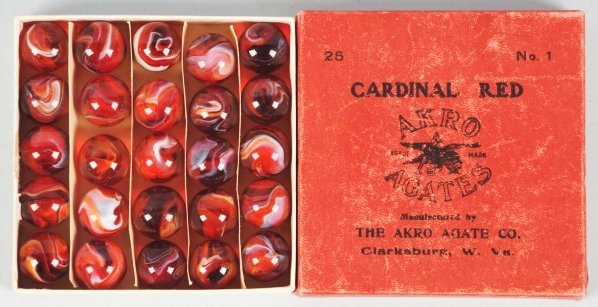 Akro Agate No. 1 Cardinal Red Marble Box Set.: Box contains 25 Akro red slag marbles. Box shows some minor wear and fading to top. Box bottom is excellent. Condition Marbles (9.5) Box (Good). Size 21/32"" to 22/32"" Dia."