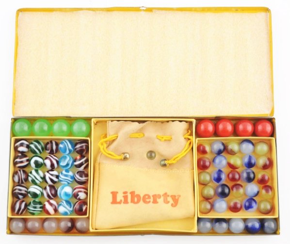 Akro Agate No. 200 Liberty Marble Tin Set.: This box contains a original Liberty bag and has 68 total marbles. Marbles include snakes, patch moss agates, and flint-style. Box shows some wear to edges and bottom. Condition Marbles (9.6) Box (Goo