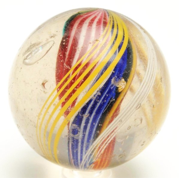 Large Multicolored Divided Core Swirl Marble.: Outer groupings of yellow and white latticino threads. Condition (8.6). Size 2 - 5/16"" Dia."