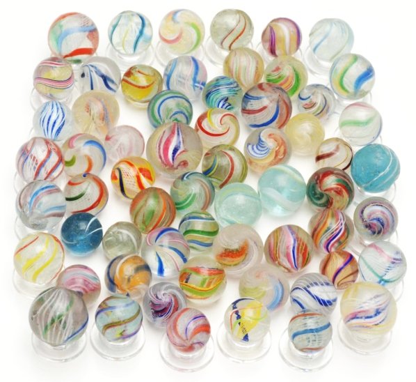 Lot of Approx. 62: Handmade Marbles.: Includes one onionskin and approximately 61 swirl marbles. Swirl marbles include solid cores, latticino cores, ribbon cores, and coreless swirls. Condition (8.0 - 9.2). Size Range: 9/16"" to 3/4"" Dia