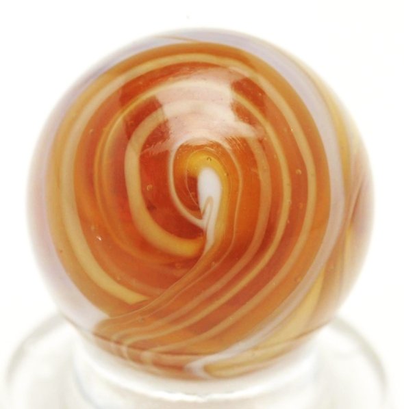 Fantastic Christensen Agate Slag Marble.: Amber slag marble with an absolutely fantastic number nine pattern. The ""nine"" loops five times and forms an incredible tail on the opposite side of marble. One of the best nine patterns we have eve