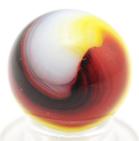 Akro Hybrid Popeye Marble with Oxblood.: With white, yellow, reddish-brown, and dark chocolate oxblood. Marble has one as-made dark spot of debris embedded in surface glass. Condition (9.5). Size 5/8"" Dia."