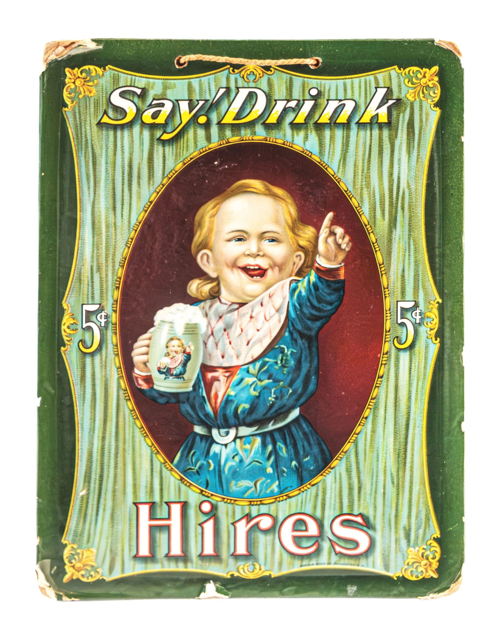 HIRES ROOT BEER CELLULOID-OVER-CARDBOARD SIGN W/ UGLY KID GRAPHIC: A wonderful and early example of this celluloid-over-cardboard sign from Hires Root Beer, featuring a nice ugly kid graphic in the center. The backside of the sign retains its original manufacturer ta