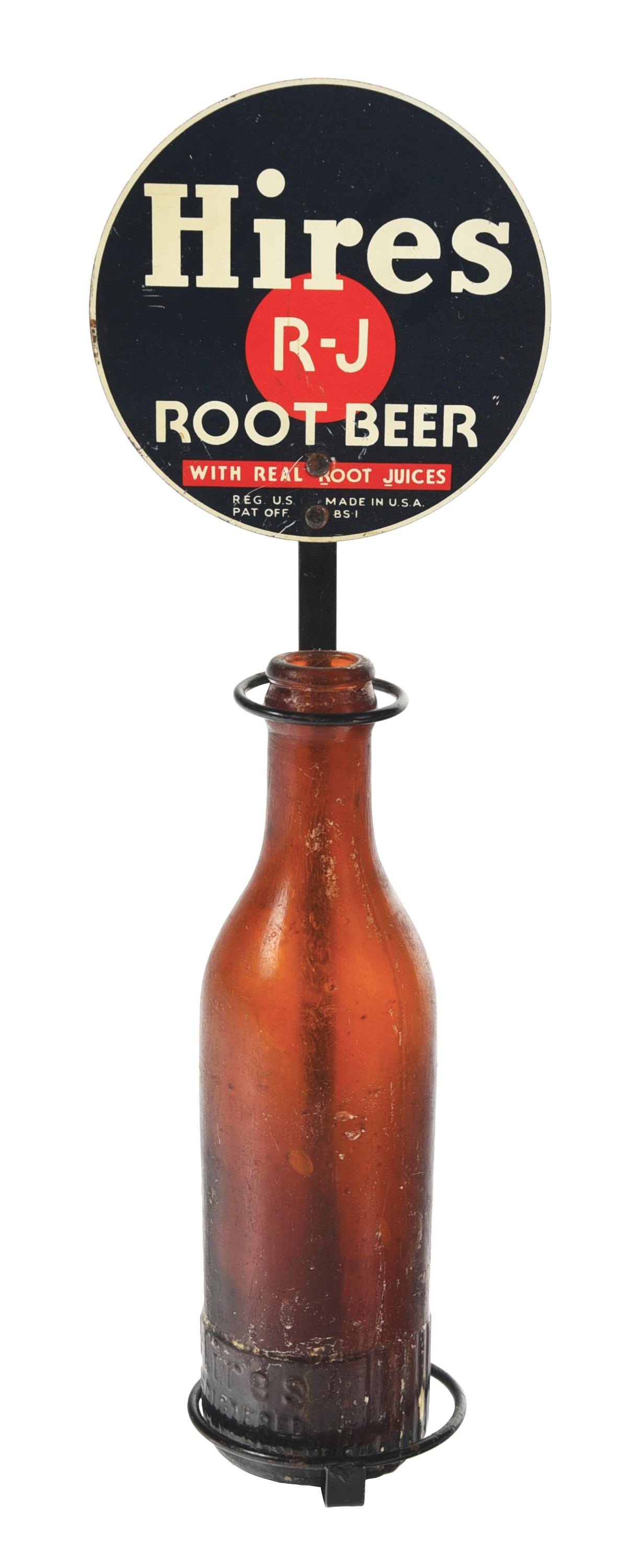 HIRES ROOT BEER TIN BOTTLE DISPLAY: A nice example of this c. 1950s tin bottle display from Hires Root Beer with the iconic company logo. CONDITION: The face of this metal display retains good color and shine. There are a few areas of s