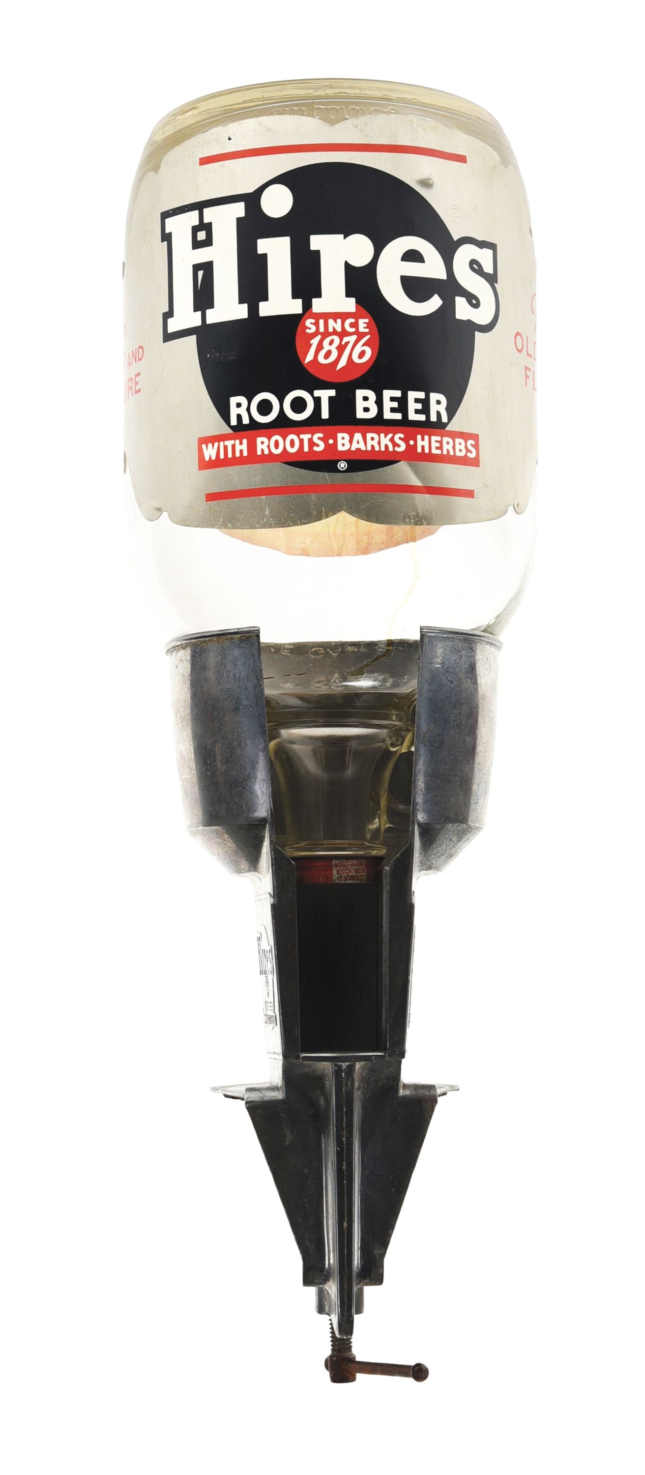 HIRES ROOT BEER COUNTER-MOUNTED SYRUP DISPENSER W/ ORIGINAL 1 GAL GLASS SYRUP JAR: A c. 1940s Hires Root Beer table-mounted syrup dispenser. CONDITION: The dispenser has good color with minor surface scratching and staining throughout the advertising panel. The hardware is complete.