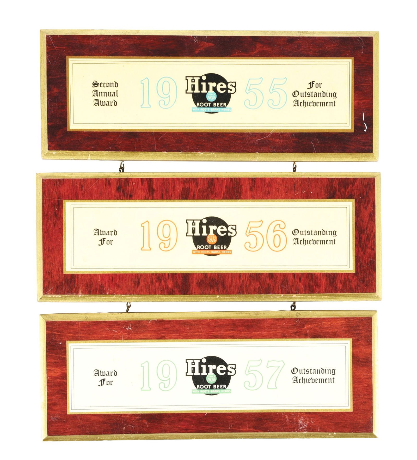 HIRES ROOT BEER SALESMAN AWARDS SIGNS: A nice set of three c. 1950s salesman award signs from Hires Root Beer. These signs are all connected by a nice original chain on the back. CONDITION: These signs are made of wood with ornately routed