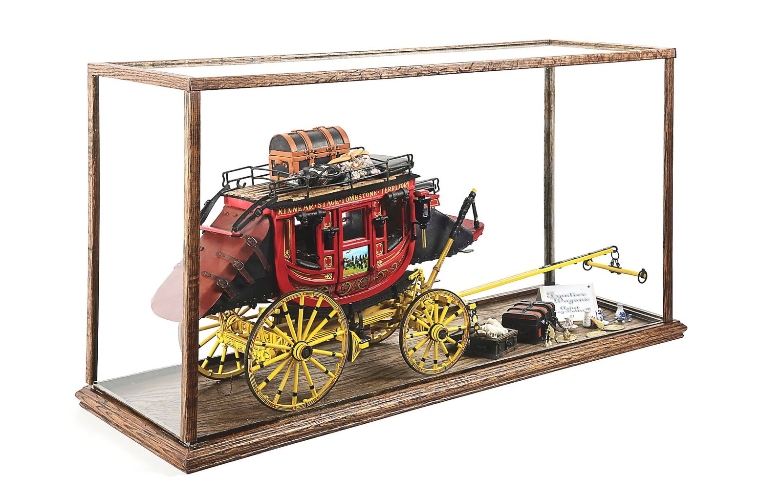ROY LUTTRELL STAGECOACH: A scale copy of the "Kinnear - Tombstone - Territory" Stagecoach by miniature master Roy Luttrell. Wood, iron and leather with highly detailed pin striping and painted door panels. Comes with all the 