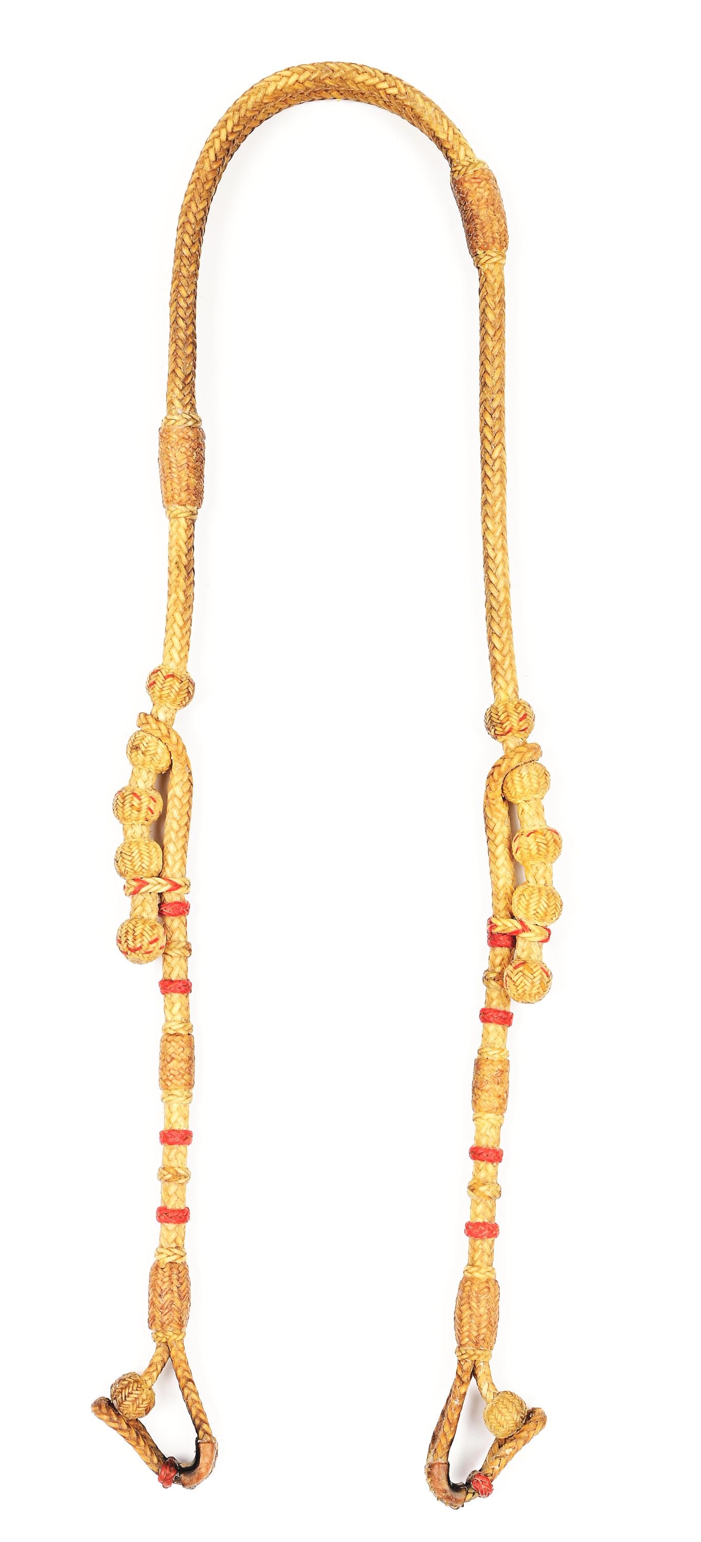 LUIS B. ORTEGA RAWHIDE HEADSTALL: Measuring 18" in overall length, this fine Ortega 16-strand, split-ear braided headstall features multiple natural buttons, some with red interweaves and wear leathers on the loops for the bit. Excell