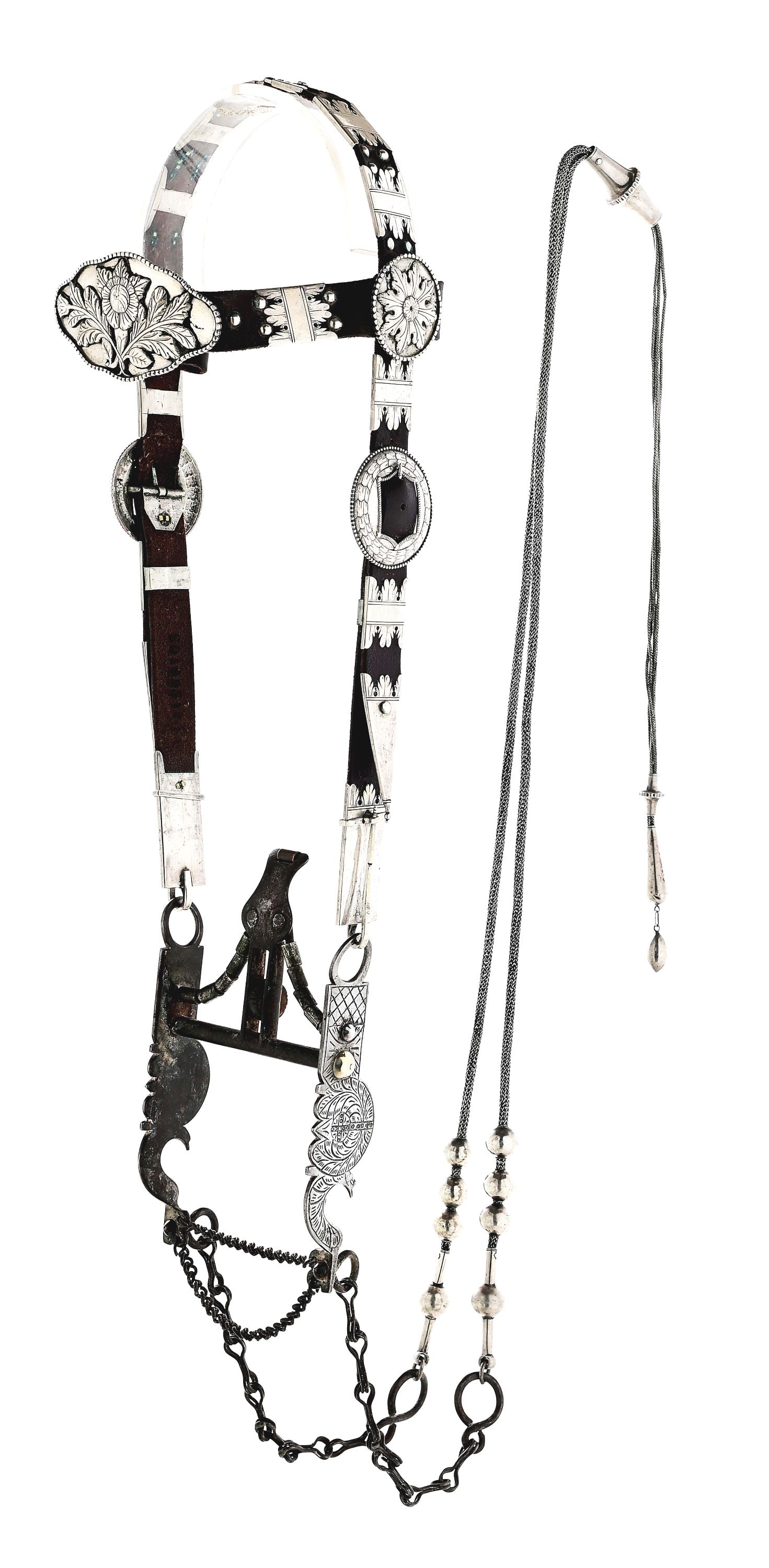 19TH CENTURY SPANISH BRIDLE: Exceptionally detailed with intricate silverwork on headstall, affixed to solid silver delicate mesh reins. The reins attach to an early 1900s fully engraved spade bit. Leather restored, otherwise all