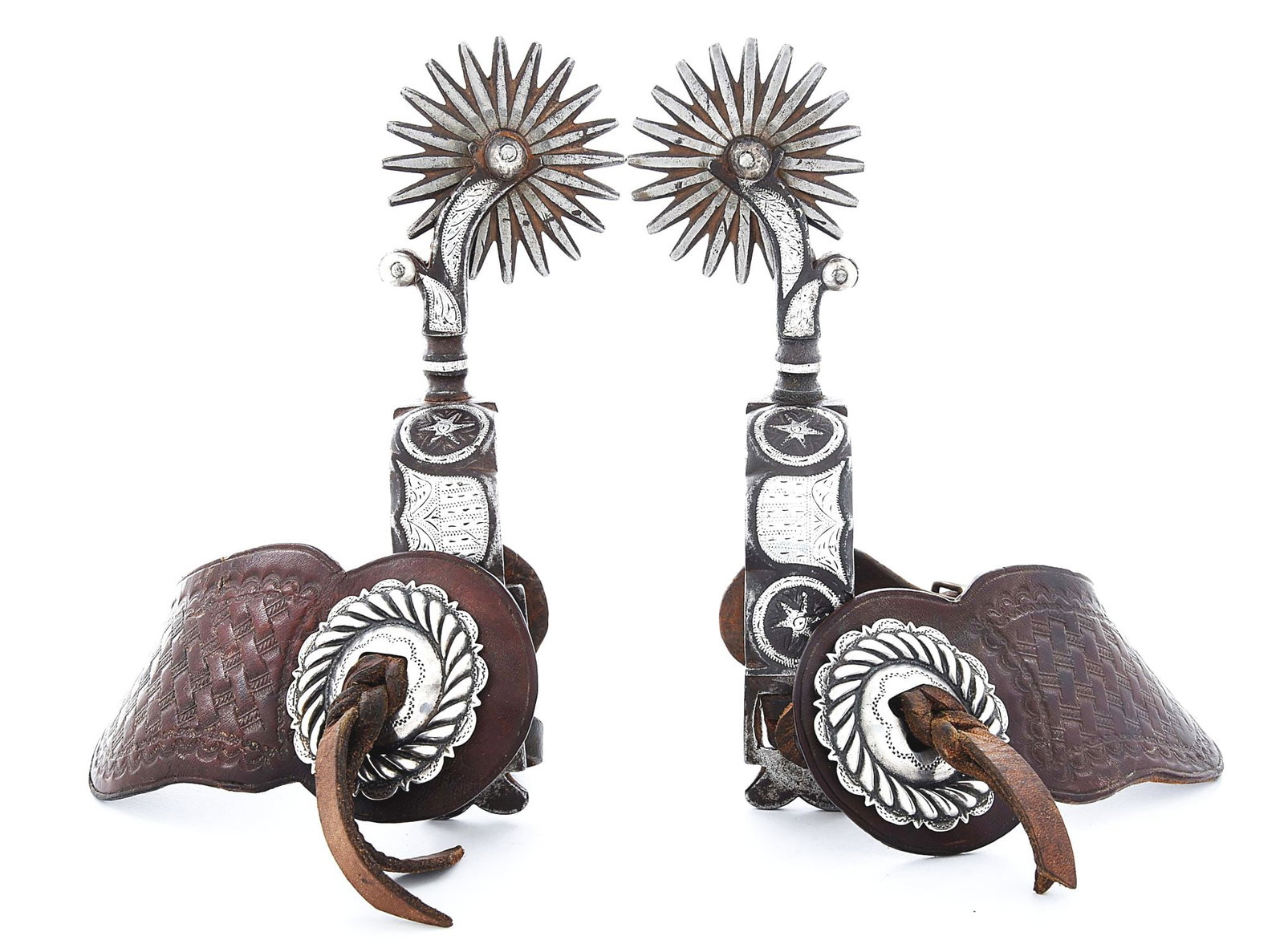SHIELD & STAR PATTERN CALIFORNIA SPURS: Unmarked California spurs with silver inlaid 1" heel band, featuring a centered stylized Union or Federal shield bracketed by silver circles with interior 6-pointed stars. Garcia style 1/4" curved sha