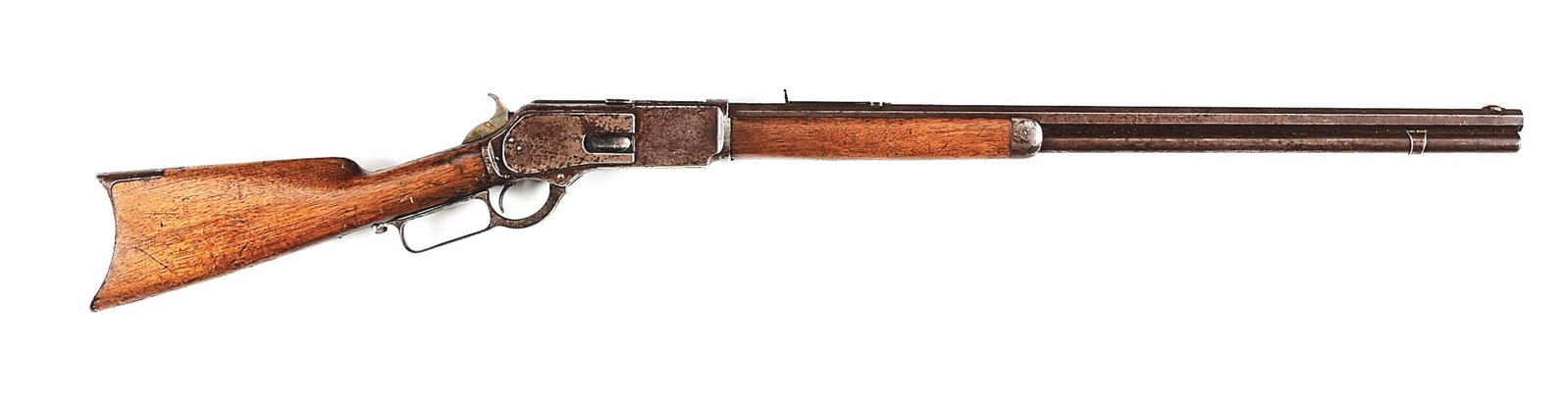 (A) WINCHESTER MODEL 1876 LEVER ACTION RIFLE: SERIAL 29433. MFG. 1882. Standard 45-60, 28" octagon barrel, full tube magazine, semi buckhorn rear sight, blade front sight, walnut stock rifle butt plate, blue finish. Caliber stamped on brass lifte