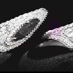 PLATINUM PINK-PURPLE KASHMIR SAPPHIRE & DIAMOND RING W/ GIA REPORT: Ladies' platinum sapphire and diamond ring consisting of 1 oval cut pink-purple Kashmir sapphire weighing 1.74cts and 96 round brilliant cut natural diamonds with a total weight of 0.83cts. Finger