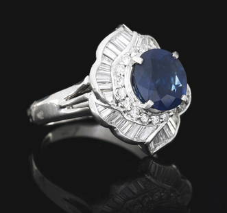 LADIES' PLATINUM SAPPHIRE & DIAMOND RING W/ GIA REPORT: Ladies' platinum sapphire and diamond ring consisting of 1 round cut blue sapphire weighing 2.74cts and 61 mixed round and baguette cut natural diamonds with a total weight of 0.80cts. Finger size