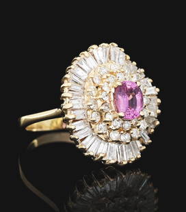 LADIES' 14K GOLD PINK TORUMALINE & DIAMOND RING W/ REPORT: Ladies' 14k yellow gold pink tourmaline and diamond ring consisting of 1 oval cut pink tourmaline weighing approximately 1.10cts and 62 mixed baguette and round brilliant cut natural diamonds with an