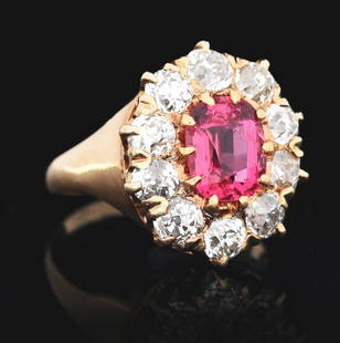 ANTIQUE 14K GOLD PINK SAPPHIRE & DIAMOND RING: Ladies' antique 14k yellow gold pink sapphire and diamond ring consisting of 1 oval cut pink sapphire measuring approximately 8 x 6.5 x 4.2mm and 10 old-mine cut round diamonds with an estimated total