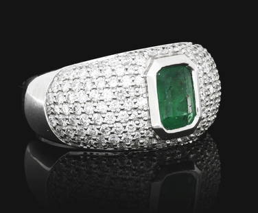 LADIES' 18K WHITE GOLD EMERALD & DIAMOND RING W/ REPORT: Ladies' 18k white gold emerald and diamond ring consisting of 1 octagonal step-cut emerald weighing 0.73cts and 1.09cts total weight in pave set round brilliant cut side diamonds. Finger size 7.