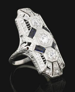 LADIES' ART-DECO PLATINUM & DIAMOND FILIGREE RING: Ladies' antique art-deco platinum filigree diamond and sapphire ring set with 3 round old mine-cut diamonds with an estimated total weight of 0.65cts, 28 round single-cut side diamonds with an