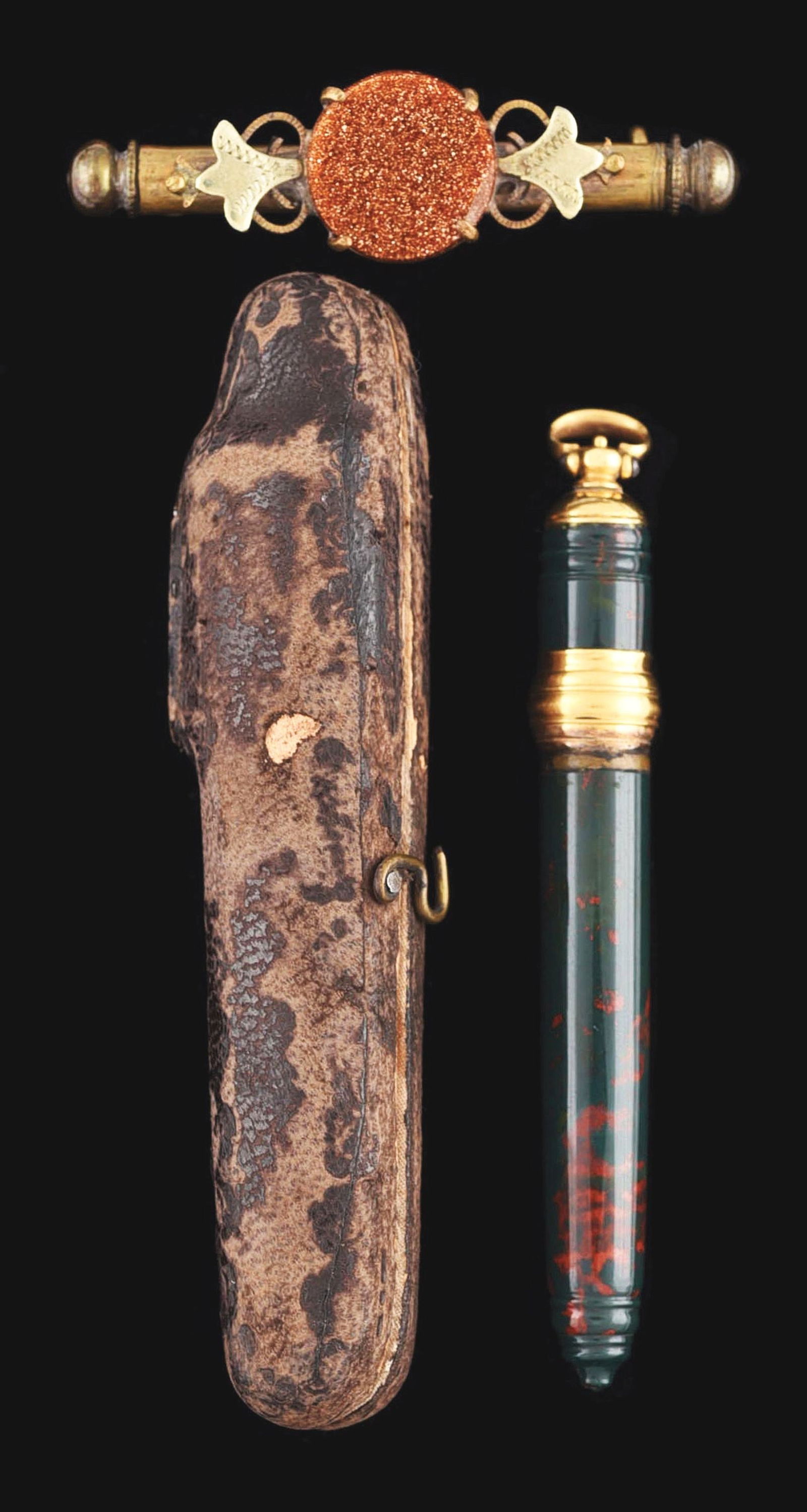 LOT OF 2: VICTORIAN NEEDLE CASES: (A) Nanny brooch needle case, 2" long. (B) Blood stone needle case with fitted case, 3" long. No damage or repairs. Condition: (Excellent) Dimensions: