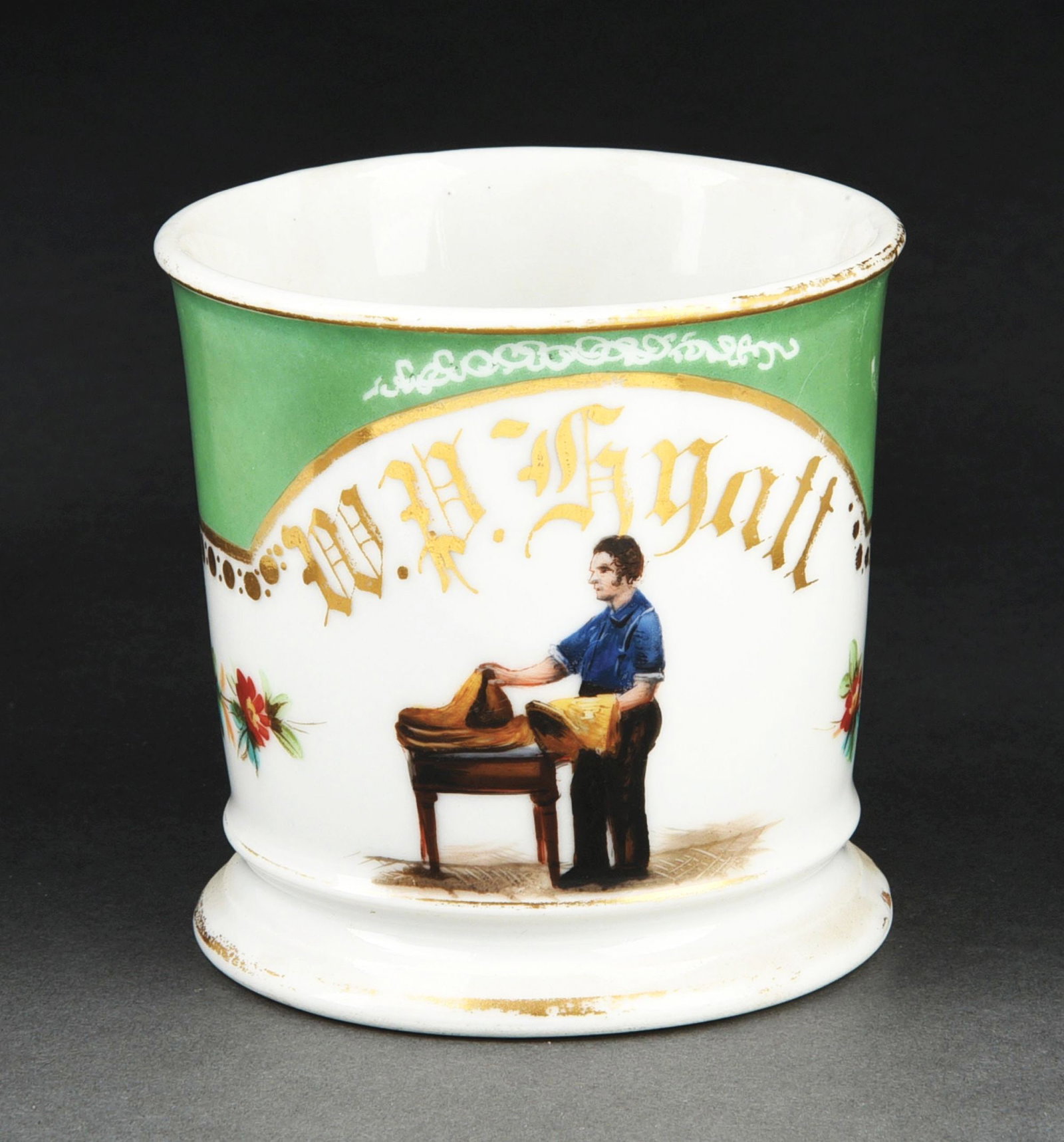 LEATHER DEALERS SHAVING MUG: Nice image of leather dealer. Has name "W.P. Gyatt" in gold gilt. Stamped D&C under base. Green wrap. Condition: (Excellent) Dimensions: 4 - 1/2" x 3 - 1/2" x 3 - 1/2".