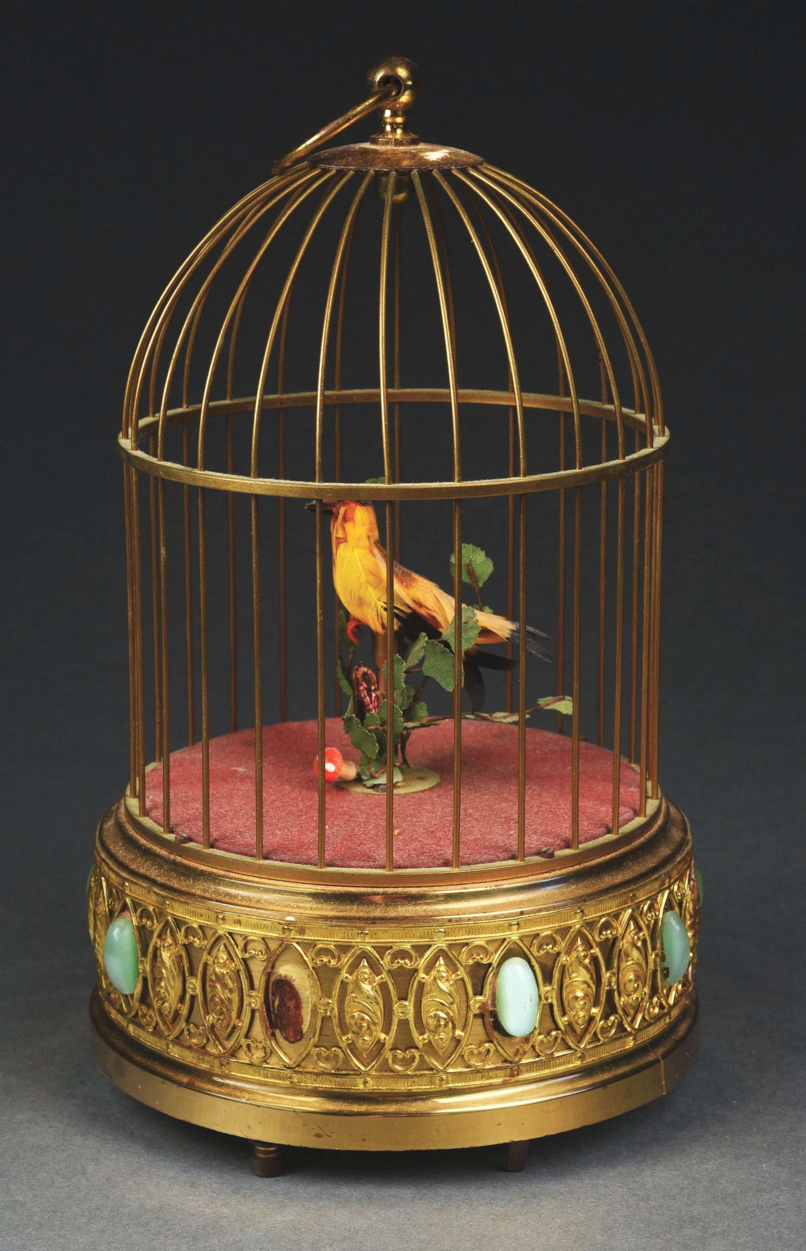 SINGING BIRD MUSICAL BOX AUTOMATON: A very nice example of an early singing bird automaton with original feathers and lots of motion. Will need the bellows serviced. Condition: (Good) Dimensions: 9 - 1/2" T. x 5 - 3/4" Dia.
