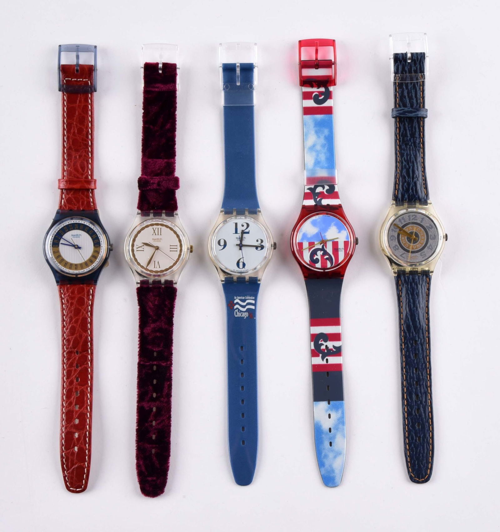 LOT OF 5: ORIGINALS AND SPECIALS SWATCHES: (A) GM119 "Campana" Standard Gents Swatch Watch. Includes 24 Hour Movement. Issued in 1994. (B) GK203 "Saint Velours" Standard Gents Swatch Watch. Issued in 1995. (C) GK170C "Chicago Democratic Conven