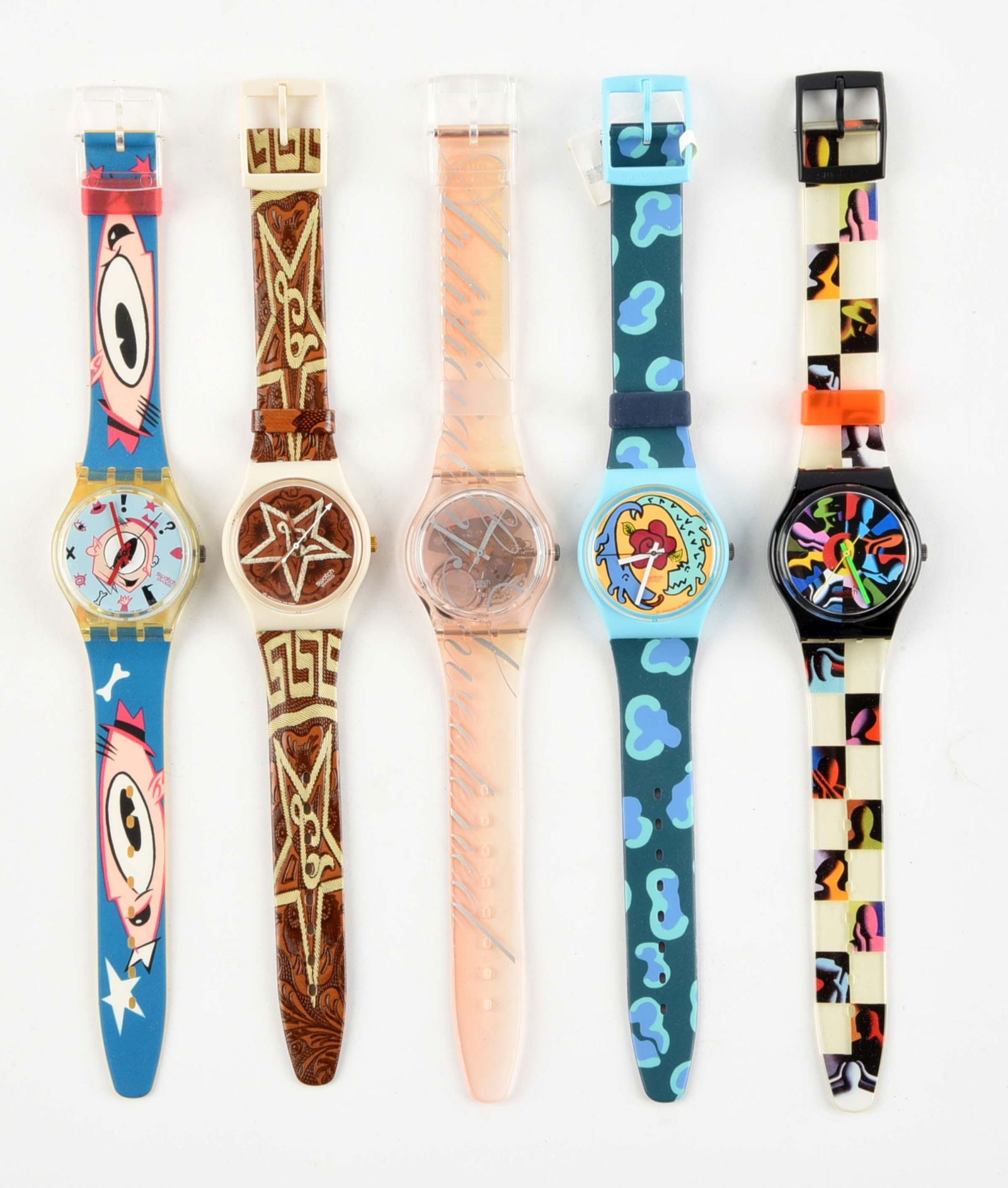 LOT OF 5: STANDARD GENTS SWATCHES: (A) GK139 "Gulp!!!" Standard Gents Swatch Watch. Designed by Massimo Giacon. Issued in 1991. (B) GW115 "Mariachi" Standard Gents Swatch Watch. Issued in 1994. (C) GR132 "Sweetened" Standard Gents Swat