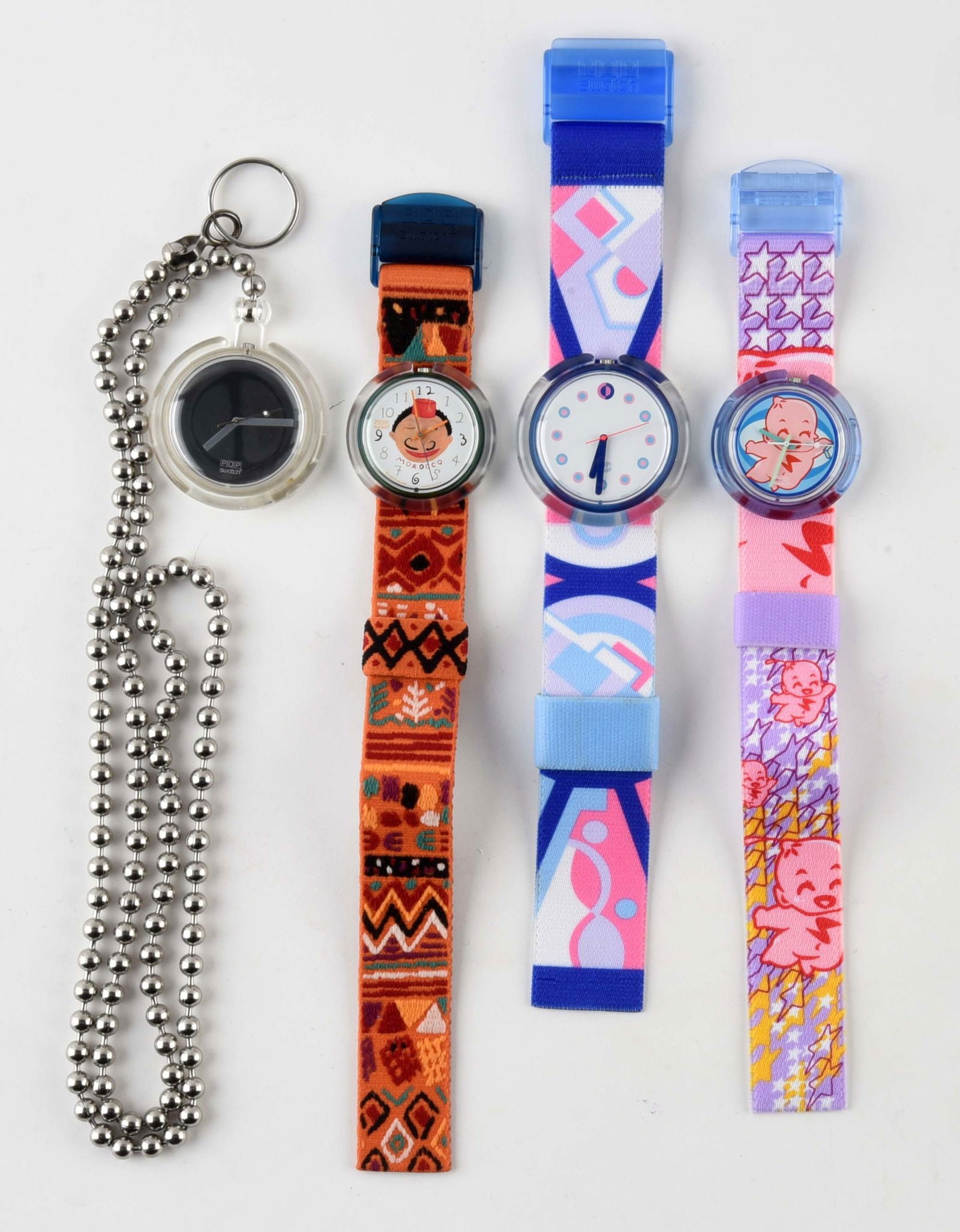 LOT OF 4: POP SWATCHES: (A) PPK103 "See U" Pop Swatch Watch. Issued in 1996. (B) PWN106 "Blub Blub" Pop Swatch Watch. Designed by Massimo Giacon. Issued in 1992. (C) PWN104 "Contessa" Pop Swatch Watch. Issued in 1991. (D) PM