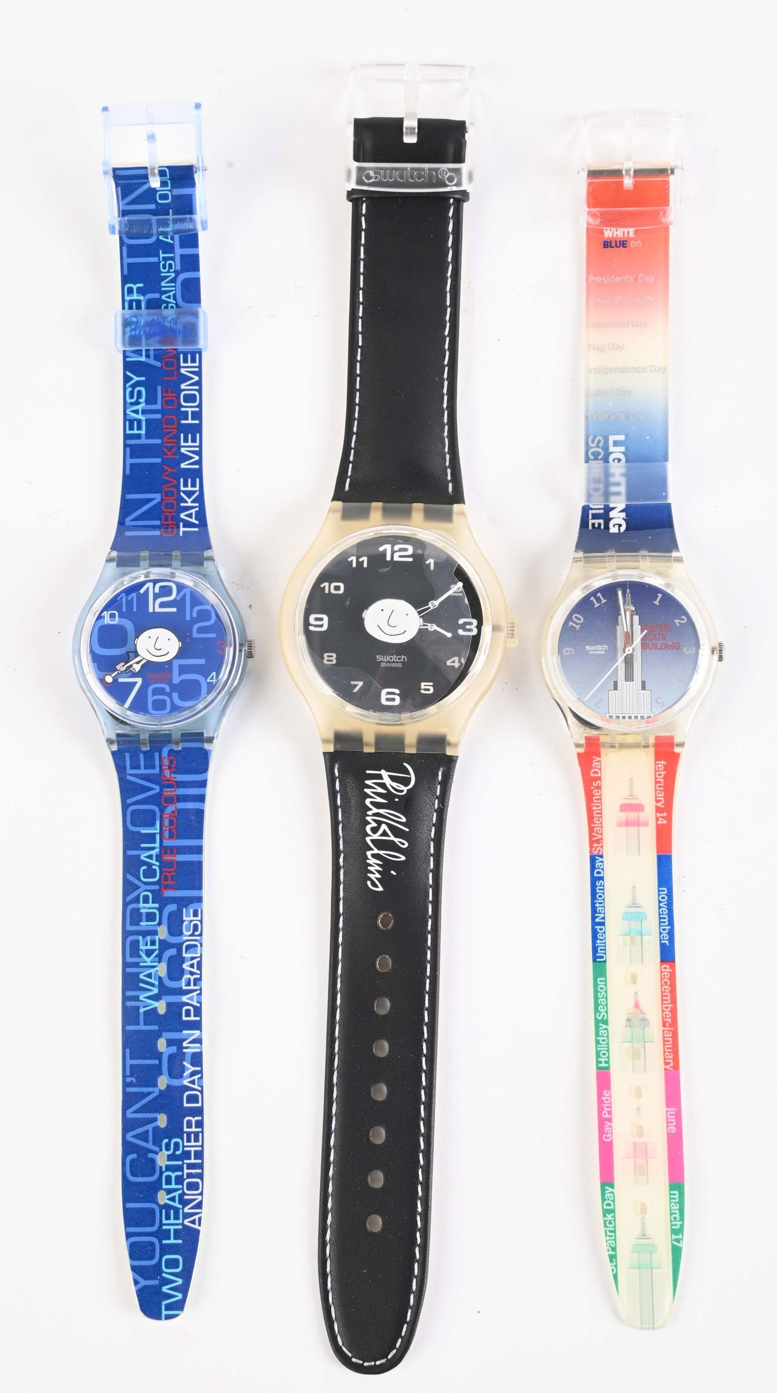 LOT OF 3: LIMITED AND SPECIALS SWATCHES: (A) GZS08 "Phil Collins Suitcase" Specials Collection Swatch Watch. Included Swatches: SUDZ100 and GZ180. Limited Numbered 6,969 of 9,999 Pieces. Issued in 2003. (B) GK309PACK "Empire State Building B