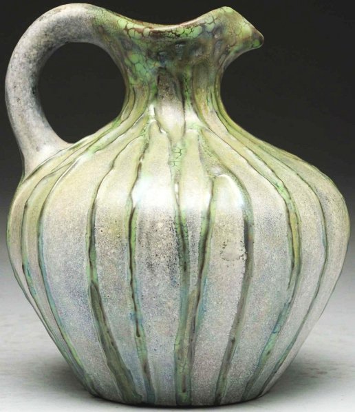 Squat Amphora Pitcher.: With raised root decoration. Combed RSTK mark. Condition (Mint). Size 7 - 1/2" T.