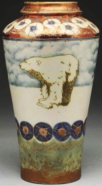 Paul Dachsel Polar Bear Vase.: With stylized flowers at top and near base and a polar bear scene in the Arctic. Paul Dachsel mark on underside. Condition (Excellent). Size 13" T.