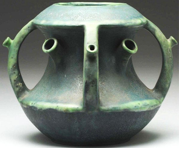 Paul Dachsel Ceramic Vase.: With eight openings for flowers and four handles. Unmarked but illustrated in "The House of Amphora" by Richard L. Scott on page 276, number 517. Condition (Mint). Size 8 - 1/4" T.