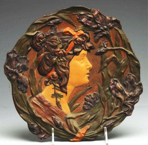 Amphora Wall Plaque.: Depicting lady. Made in Austria by Ernst Wahliss. Condition (Excellent). Size 13" Dia.