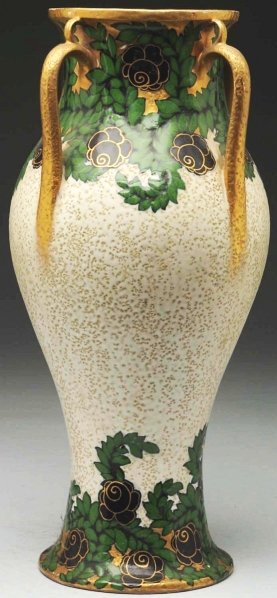 Highly Stylized Ernst Wahliss Secessionist Vase.: Model #3634. With four handles and floral decoration at base and top. Stylized black roses in gold and green. Ernst Wahliss mark on underside. Condition (Mint). Size 15 - 1/2" T.