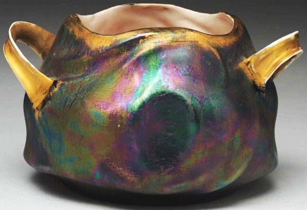 Austrian Iridized Art Nouveau Bowl.: With two handles. Carl Knoll mark on underside. Condition (Mint). Size 4 - 1/2" T.
