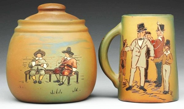Lot of 2: Weller Dickensware Pieces.: Includes one humidor, marked, and one mug marked with David Copperfield saying on rear of mug. Condition (Excellent). Size Largest: 6 - 1/2" T.